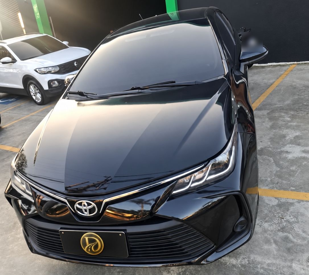 Frente do Toyota Corolla preto usado nos traslados da Decisão Executive Transfer